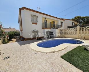 Exterior view of Single-family semi-detached for sale in Vélez-Málaga  with Swimming Pool