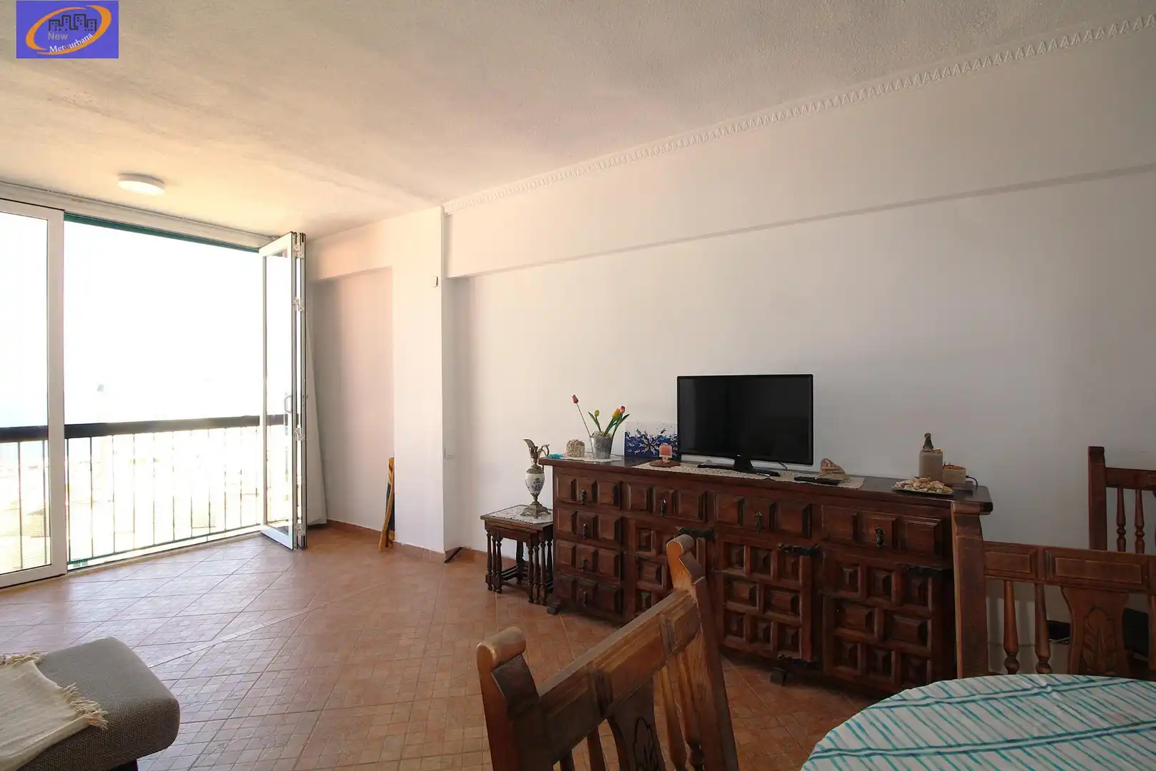 Sala d'estar de Apartament de lloguer en La Pobla de Farnals amb Jardí privat, Moblat i Piscina comunitària