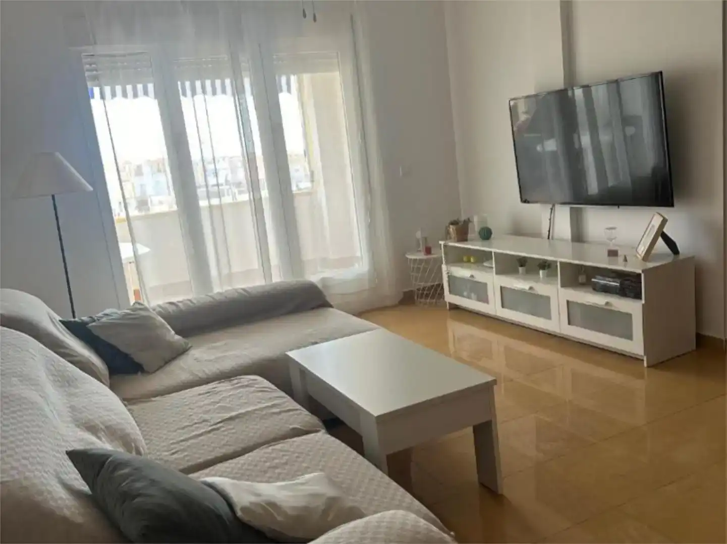 Sala de estar de Apartamento de alquiler en Pulpí con Jardín privado, Piscina y Amueblado