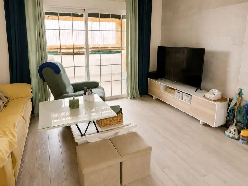 Sala de estar de Casa adosada en venta en Almuñécar con Aire acondicionado, Terraza y Balcón