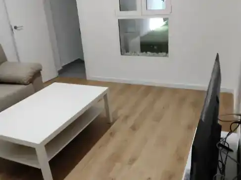 Sala d'estar de Dúplex de lloguer en Murcia amb Aire condicionat i Moblat