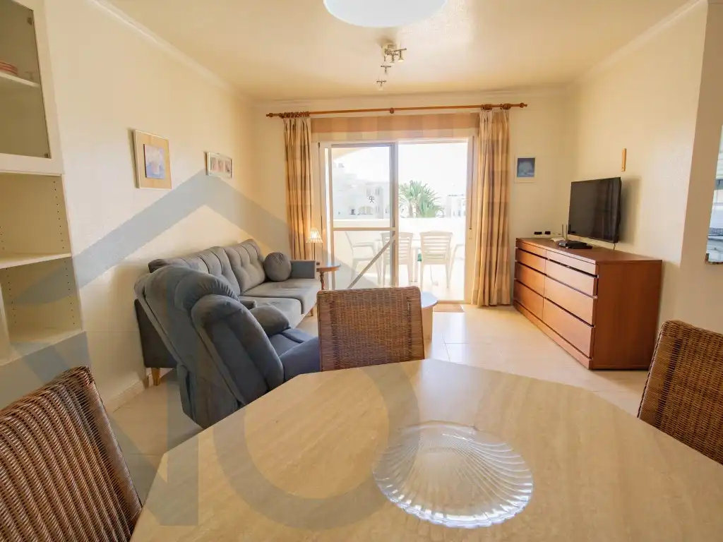 Sala d'estar de Apartament en venda en Pulpí amb Aire condicionat i Moblat