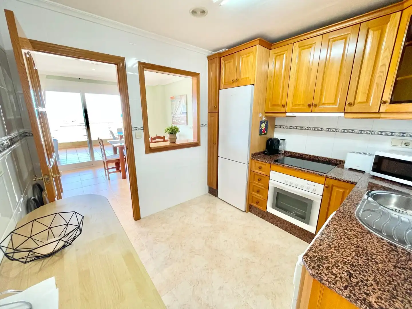 Cuina de Apartament de lloguer en Cartagena amb Aire condicionat, Piscina i Moblat