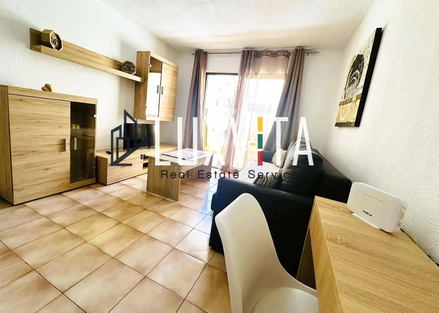 Sala d'estar de Apartament en venda en Arona amb Jardí privat, Terrassa i Moblat
