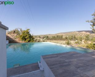 Swimming pool of House or chalet for sale in Iznalloz  with Air Conditioner, Terrace and Swimming Pool