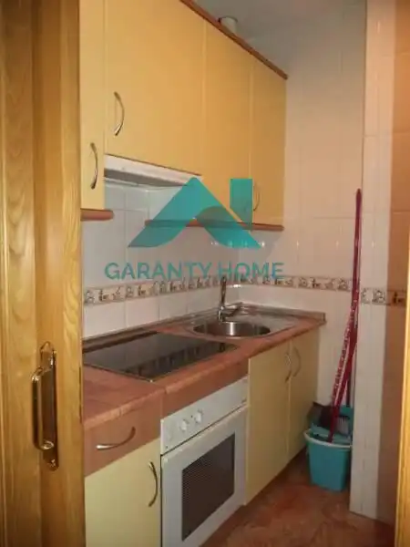 Cuina de Apartament de lloguer en Cáceres amb Aire condicionat i Moblat