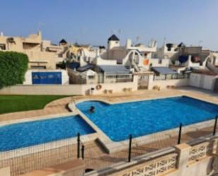 Swimming pool of Single-family semi-detached for sale in Orihuela  with Air Conditioner, Terrace and Swimming Pool