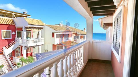 Foto 2 de Casa adosada en venda a Avenida Avenida de la Libertad, 72, Guardamar Playa, Alicante