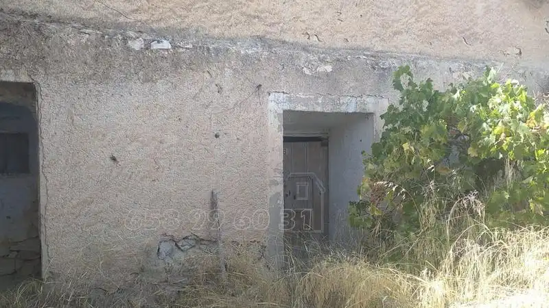 Vista exterior de Finca rústica en venda en Baza amb Jardí privat, Terrassa i Traster