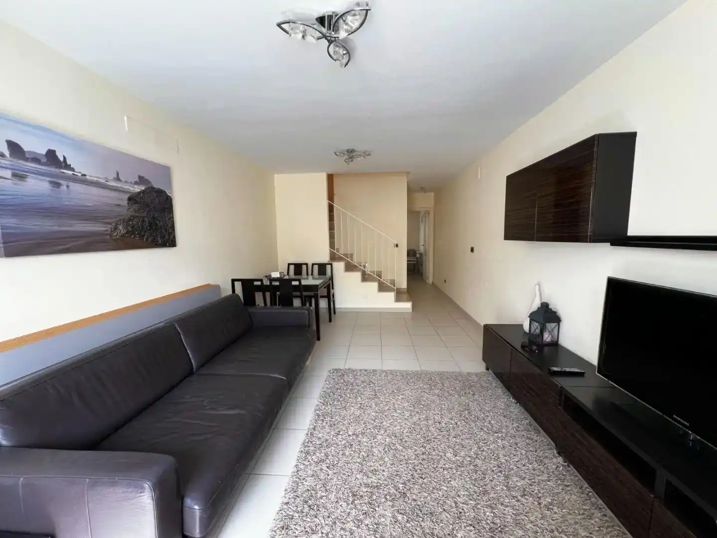 Sala d'estar de Casa adosada en venda en Agaete amb Piscina i Balcó