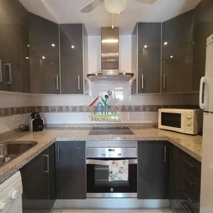 Cuina de Apartament en venda en Almonte amb Aire condicionat, Terrassa i Piscina comunitària