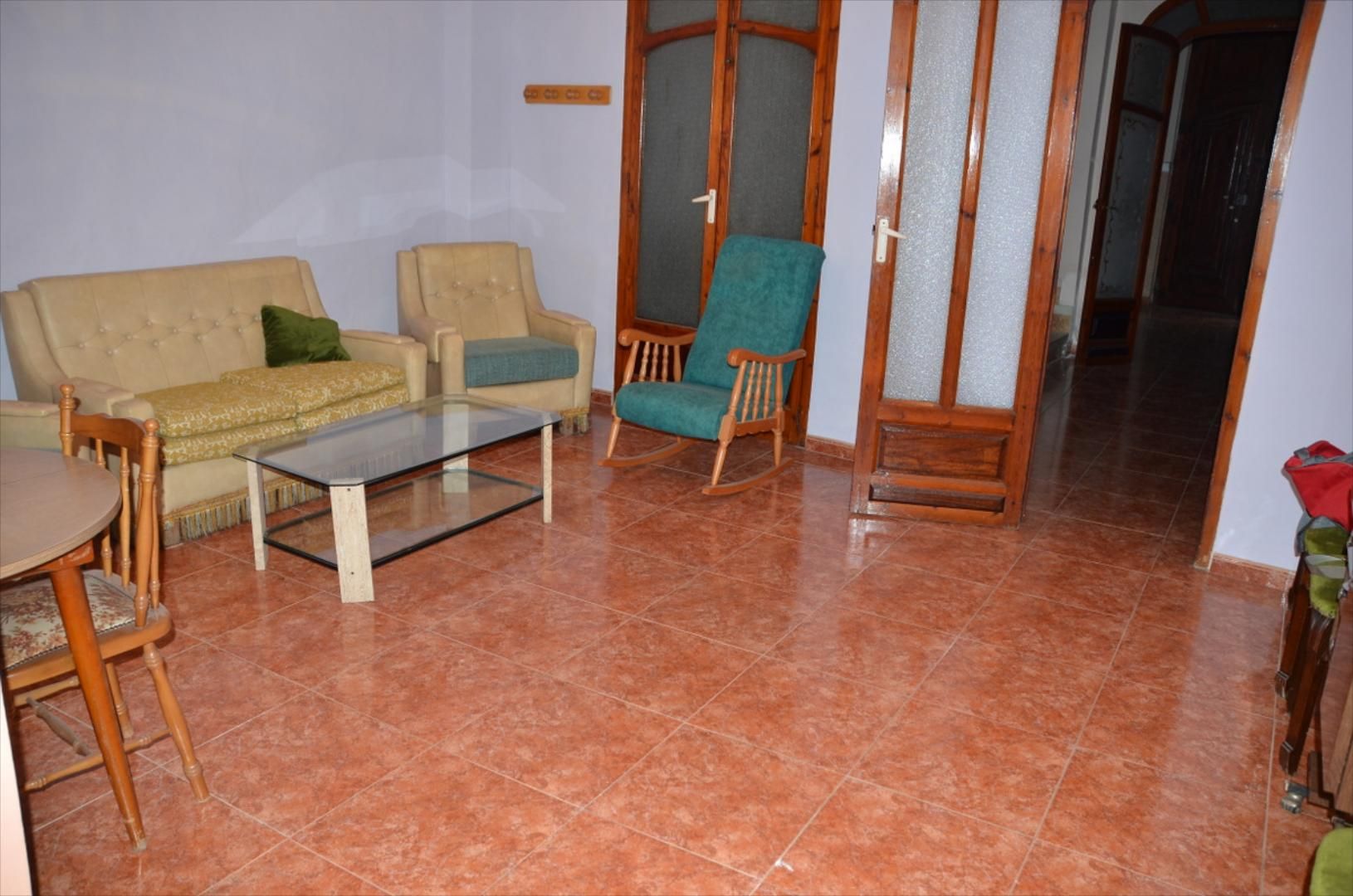 Sala d'estar de Casa adosada en venda en Llaurí amb Terrassa i Traster