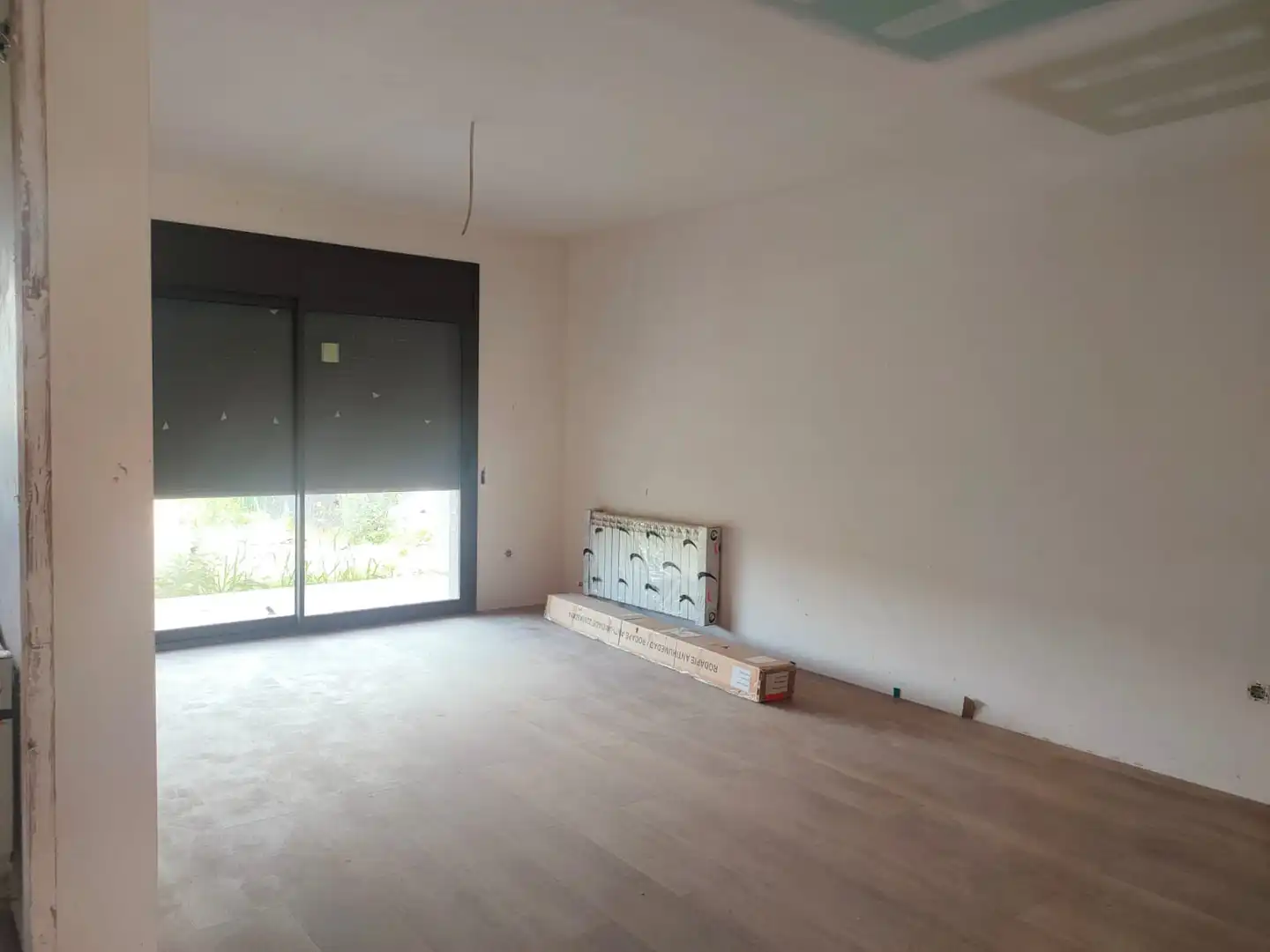 Sala d'estar de Casa adosada en venda en Riudarenes amb Calefacció, Jardí privat i Parquet