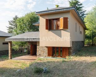 Vista exterior de Casa o xalet en venda en El Boalo - Cerceda – Mataelpino amb Calefacció, Jardí privat i Terrassa