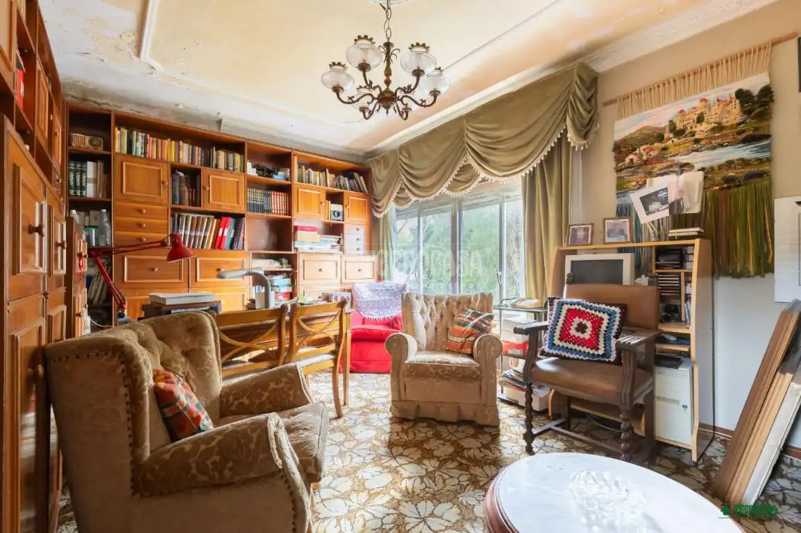 Sala de estar de Casa adosada en venta en Almería con Jardín privado y Terraza