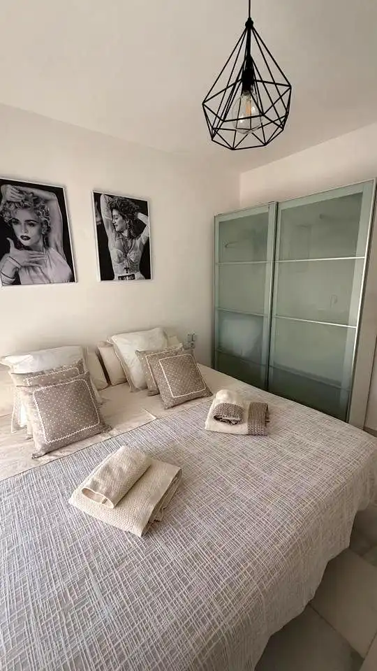 Habitación de Casa adosada en venta en Málaga con Aire acondicionado y Piscina comunitaria