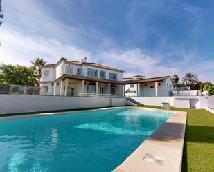 Swimming pool of House or chalet for sale in Bormujos  with Air Conditioner, Heating and Terrace