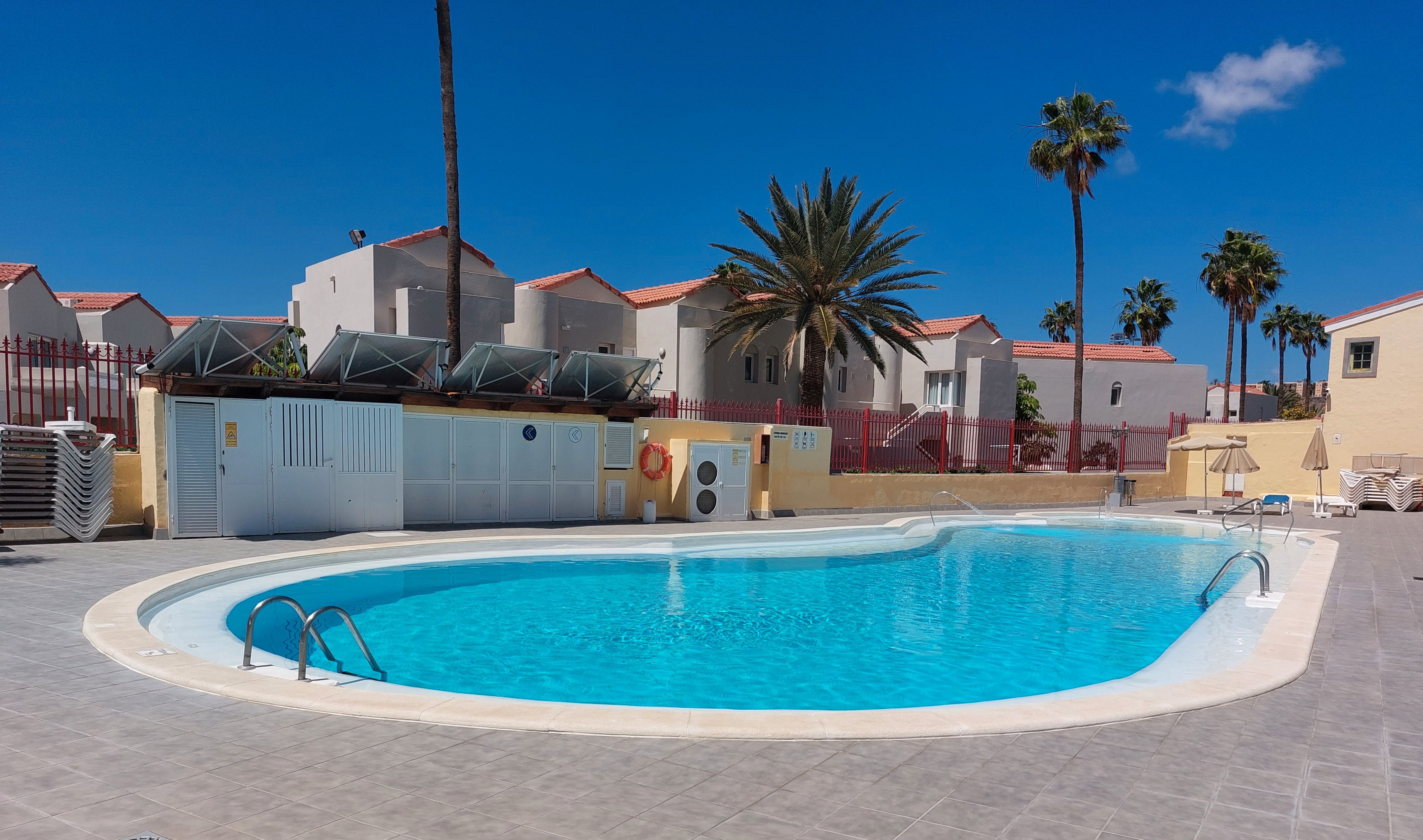 Piscina de Dúplex de lloguer en San Bartolomé de Tirajana amb Aire condicionat, Jardí privat i Terrassa