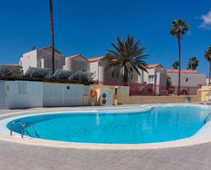 Piscina de Dúplex de lloguer en San Bartolomé de Tirajana amb Aire condicionat, Jardí privat i Terrassa