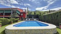 Swimming pool of House or chalet for sale in Genovés  with Air Conditioner, Heating and Private garden