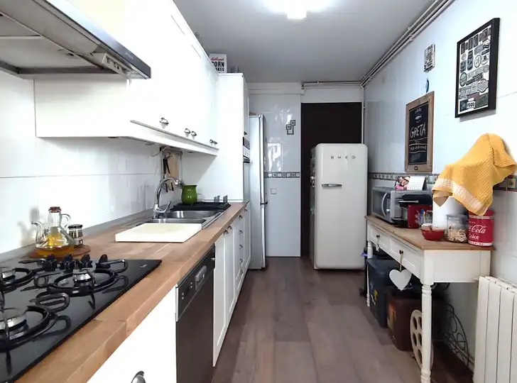 Küche von Dachboden zum Verkauf in Sant Andreu de Llavaneres mit Klimaanlage, Heizung und Parkett