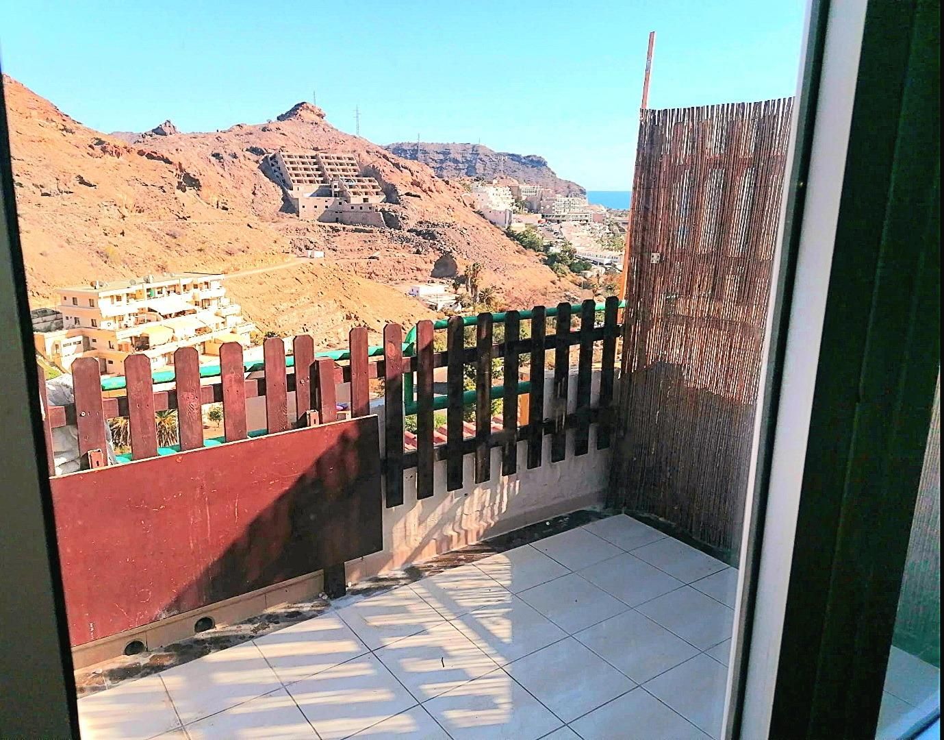 Vista exterior de Apartament en venda en Mogán amb Jardí privat, Terrassa i Traster