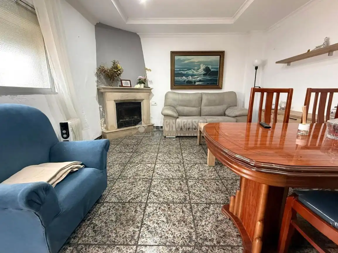 Sala d'estar de Casa adosada en venda en Málaga amb Jardí privat