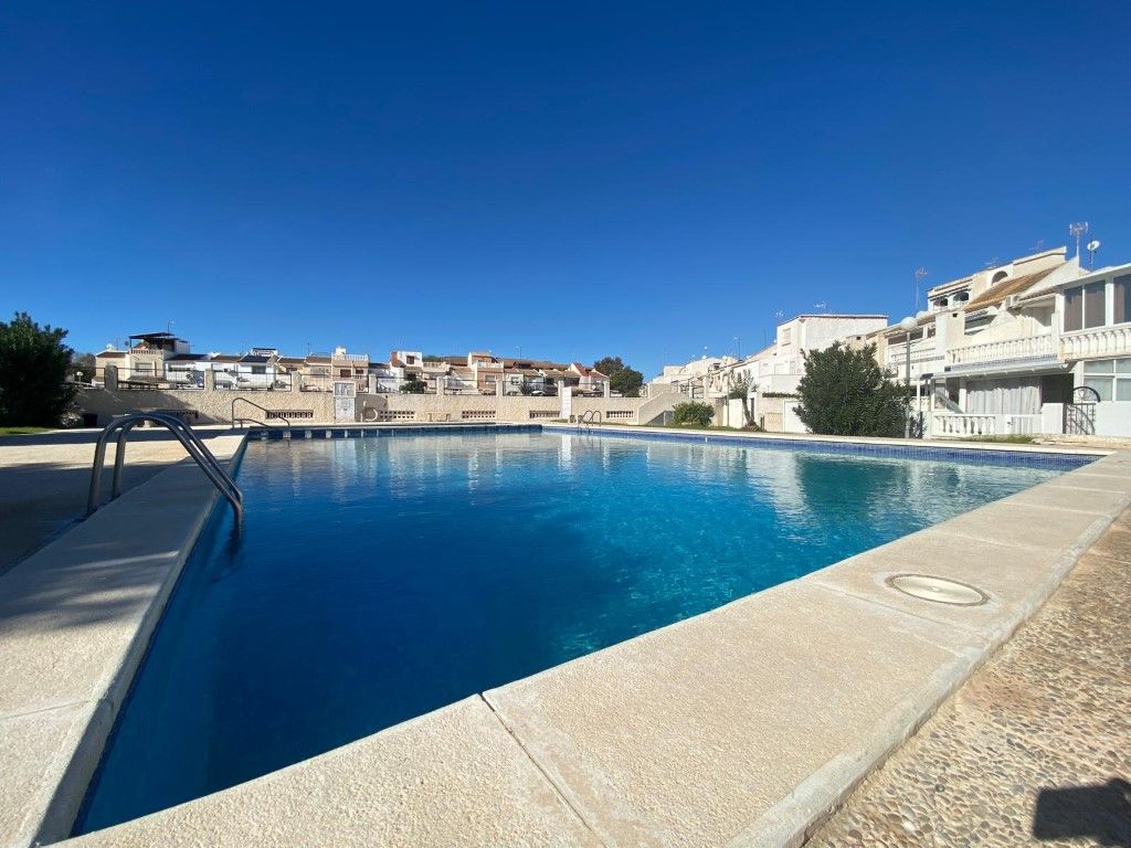 Swimming pool of Single-family semi-detached for sale in Torrevieja  with Air Conditioner, Furnished and Oven