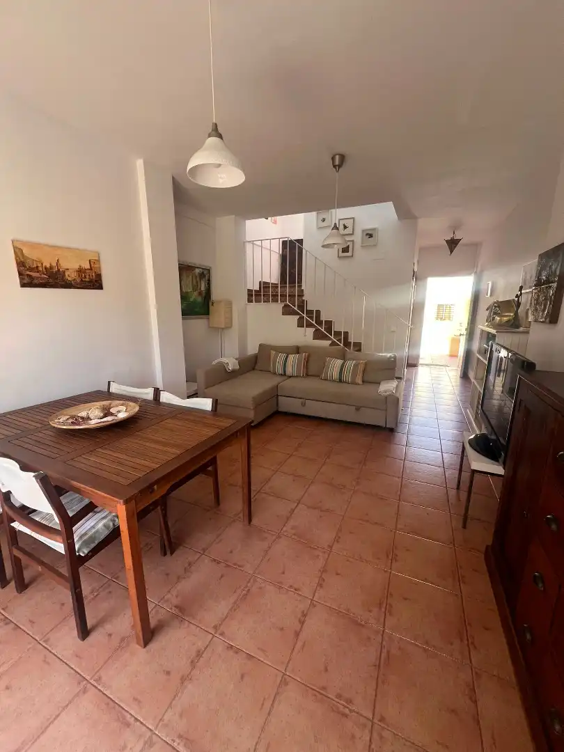 Sala de estar de Casa adosada en venta en Islantilla con Jardín privado, Trastero y Piscina comunitaria