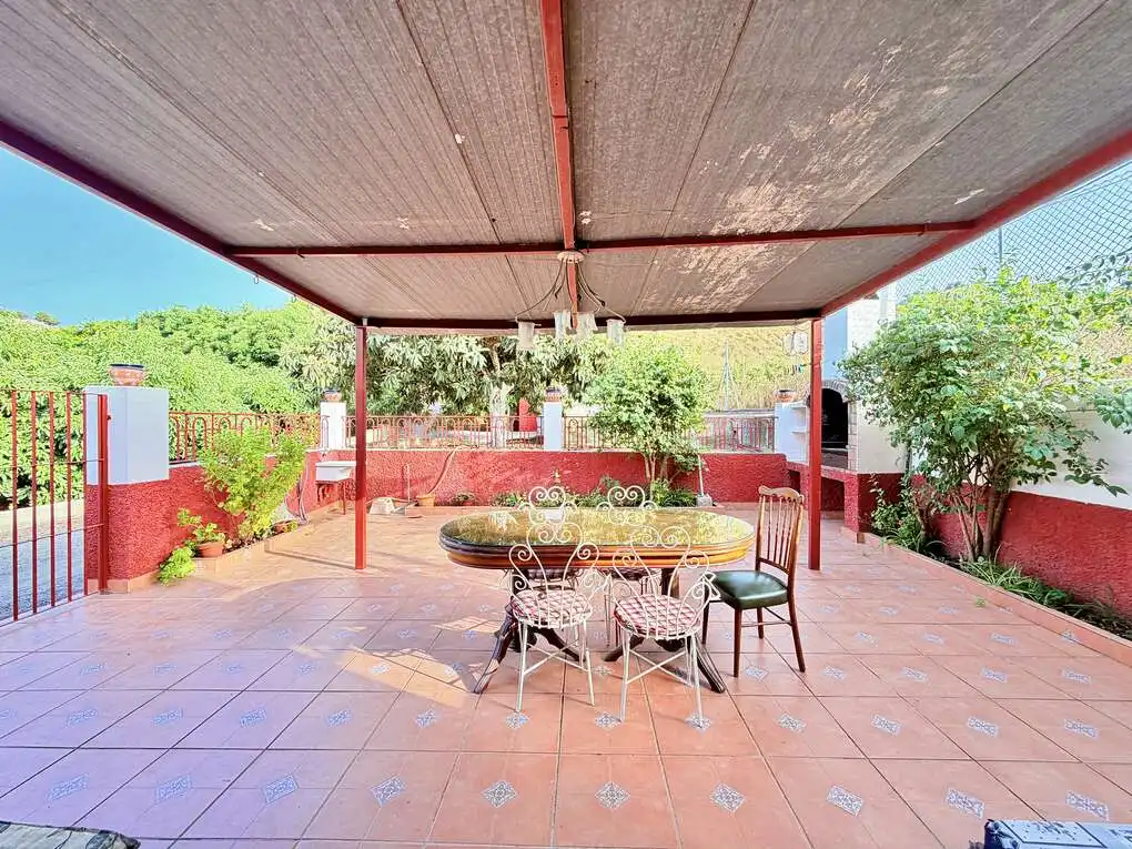Terrassa de Casa o xalet en venda en Benamocarra amb Jardí privat i Moblat