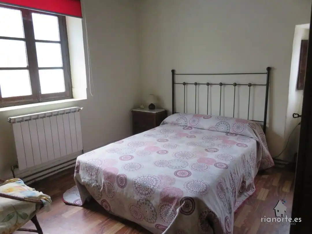 Habitación de Casa o chalet en venta en Ribadesella con Calefacción, Jardín privado y Amueblado