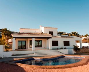 Vista exterior de Casa o xalet en venda en Moraira amb Calefacció, Jardí privat i Terrassa