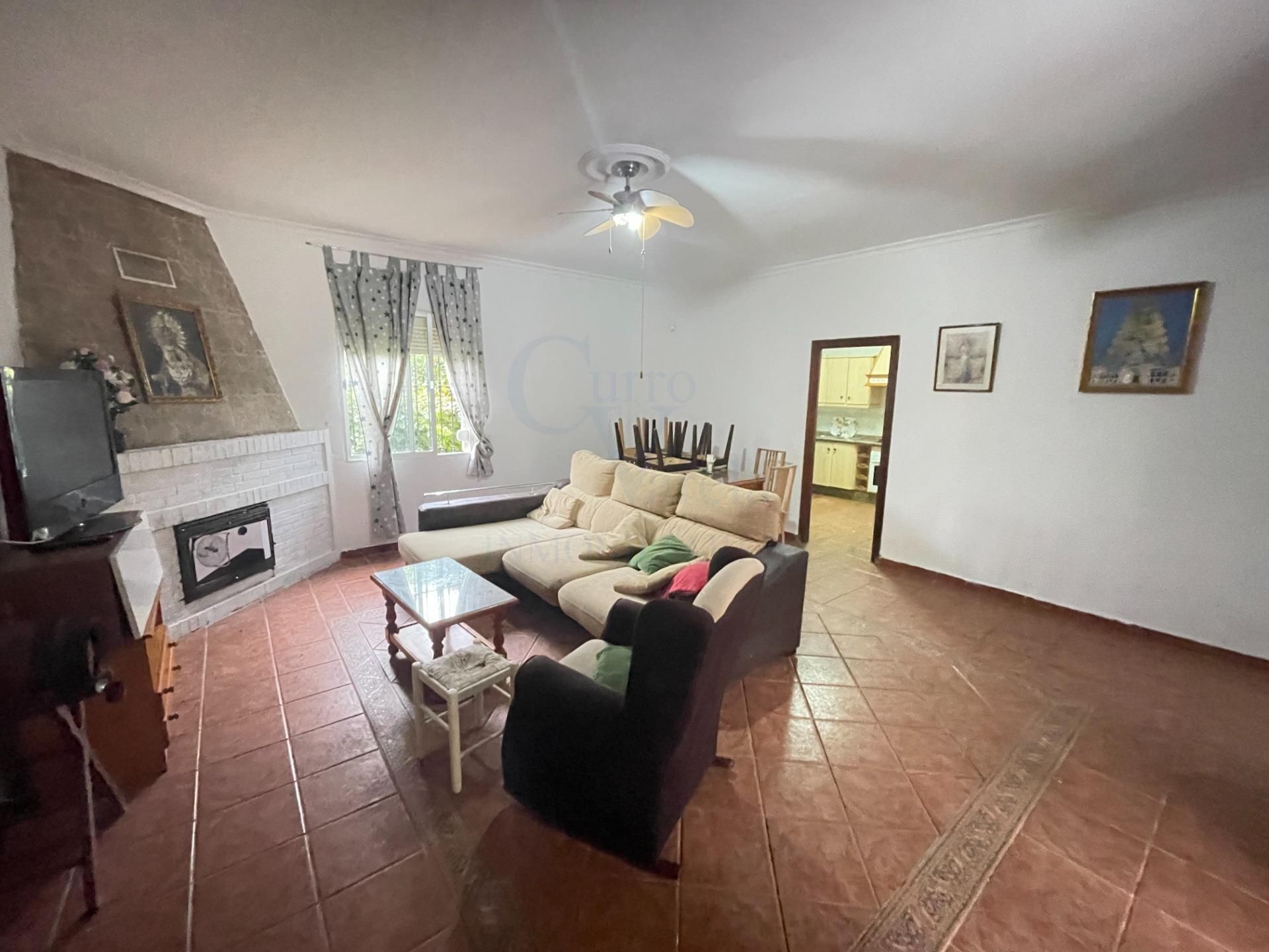 Living room of Country house for sale in Dos Hermanas  with Air Conditioner, Heating and Private garden