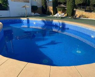 Swimming pool of Single-family semi-detached for sale in Calpe / Calp  with Air Conditioner, Private garden and Terrace
