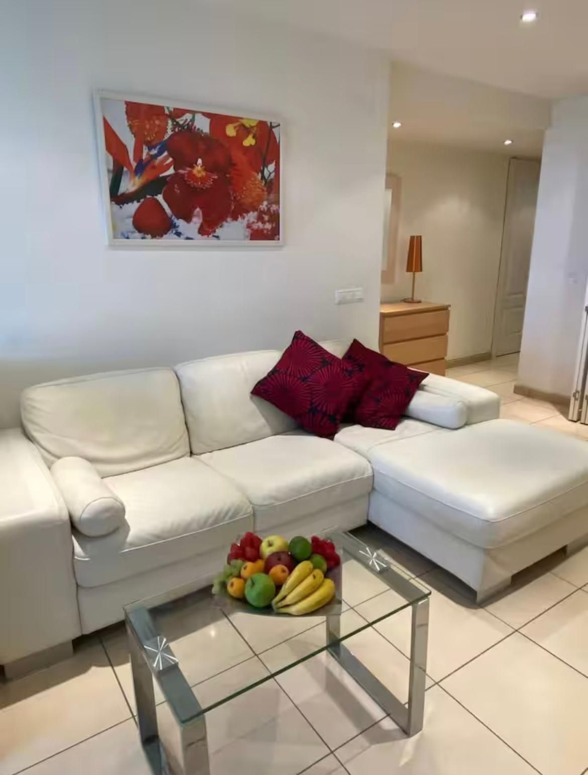 Sala d'estar de Apartament en venda en Torremolinos amb Aire condicionat, Jardí privat i Terrassa