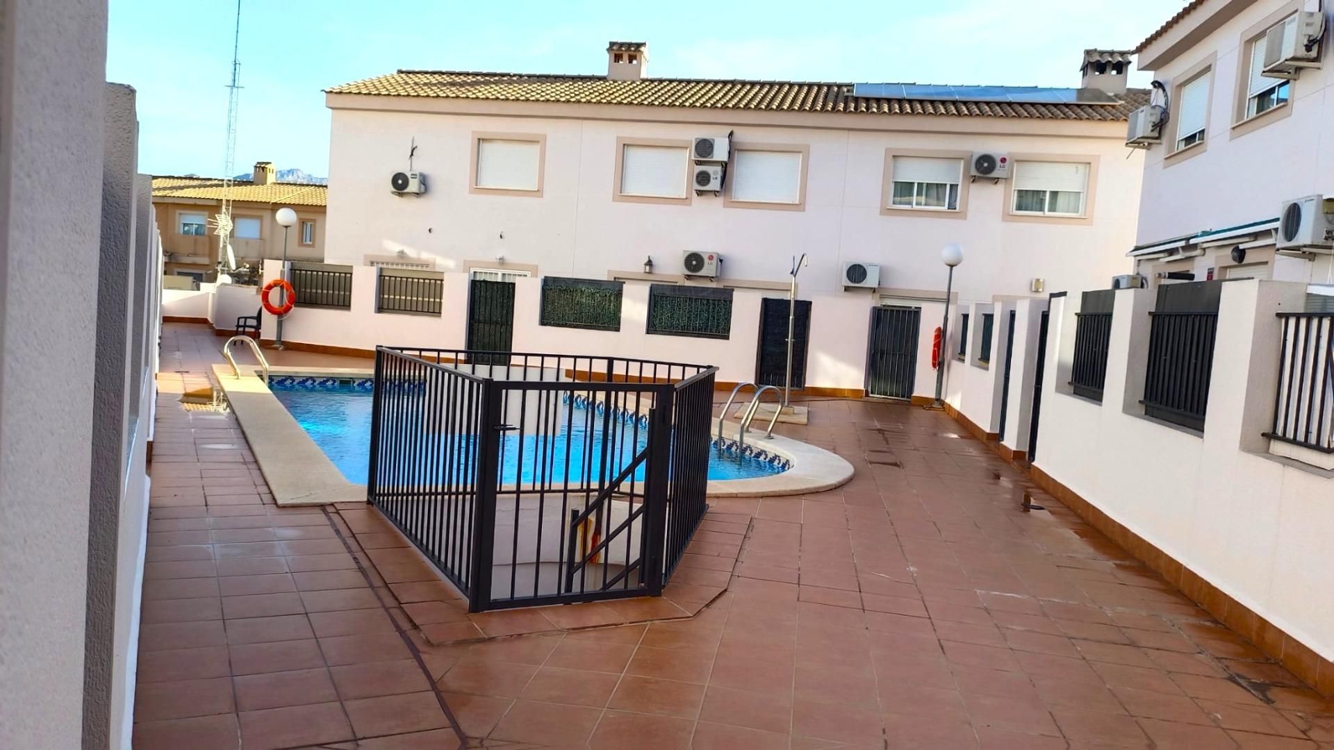 Swimming pool of Single-family semi-detached for sale in La Nucia  with Air Conditioner, Private garden and Terrace