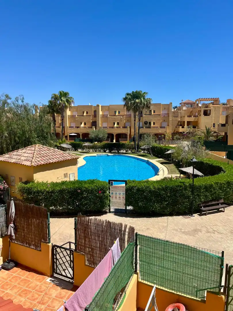 Vista exterior de Casa adosada en venda en Vera amb Terrassa, Moblat i Piscina comunitària