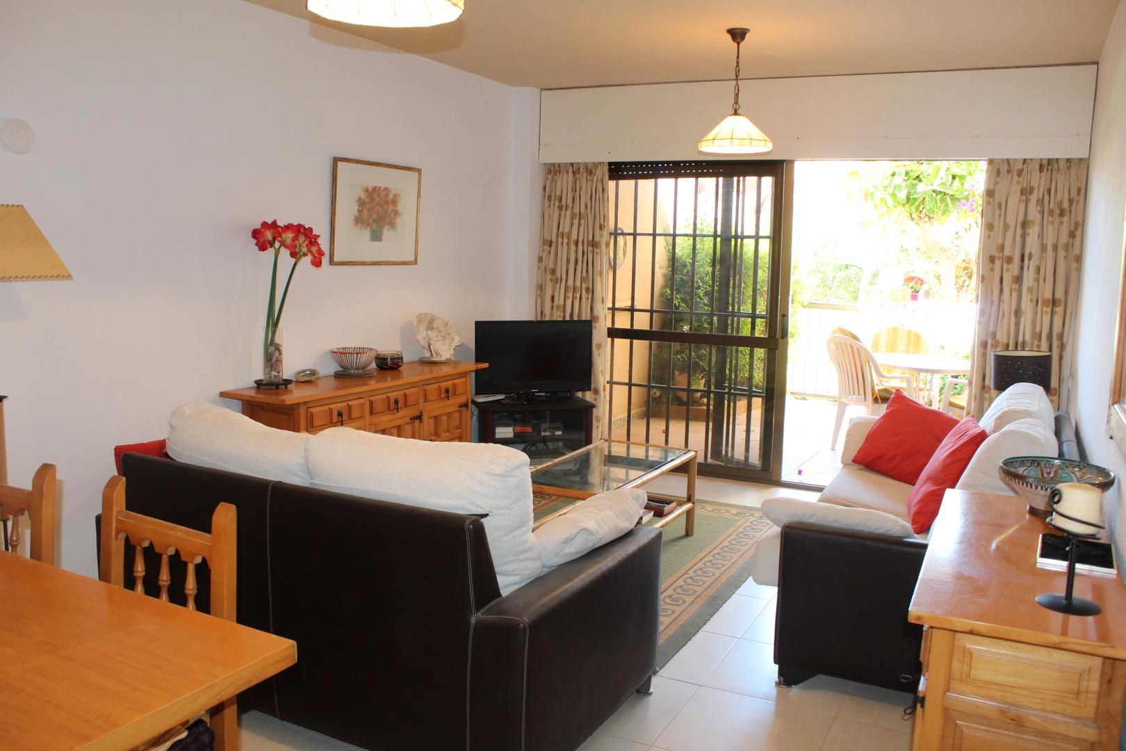 Living room of Planta baja for sale in Roquetas de Mar  with Terrace, Furnished and Oven