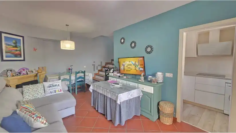 Sala d'estar de Casa adosada en venda en El Portil amb Aire condicionat i Balcó