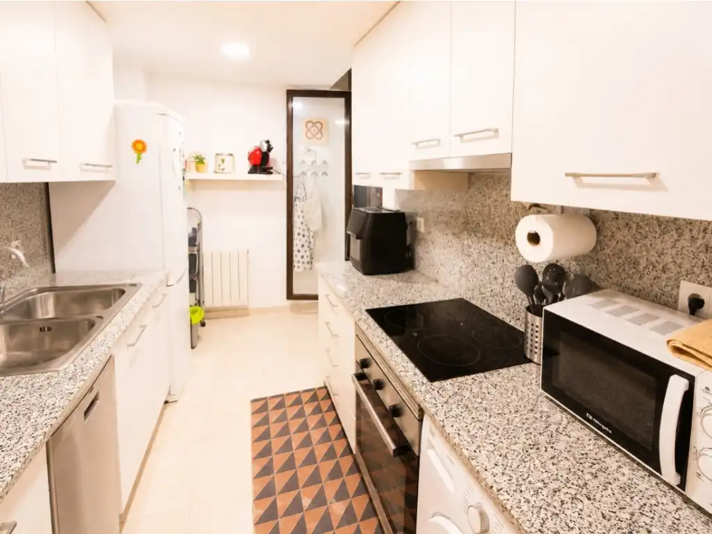 Kitchen of Flat for sale in El Vendrell  with Heating, Private garden and Oven