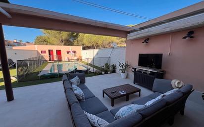 Terrasse von Einfamilien-Reihenhaus zum verkauf in Aljaraque mit Klimaanlage, Terrasse und Schwimmbad