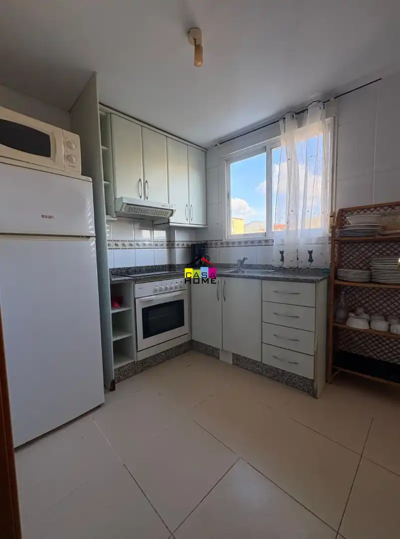 Cuina de Apartament en venda en Benicasim / Benicàssim amb Aire condicionat, Jardí privat i Moblat