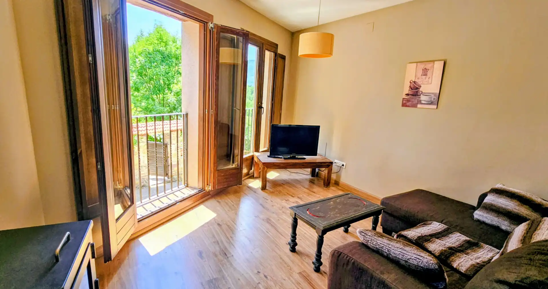 Sala de estar de Dúplex en venta en El Pont de Suert con Calefacción, Parquet y Amueblado