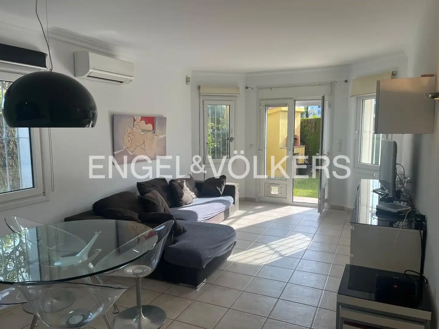 Sala de estar de Casa adosada de alquiler en Oliva con Aire acondicionado, Calefacción y Jardín privado