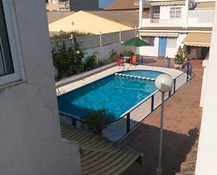 Swimming pool of Single-family semi-detached for sale in Los Alcázares  with Air Conditioner, Terrace and Furnished