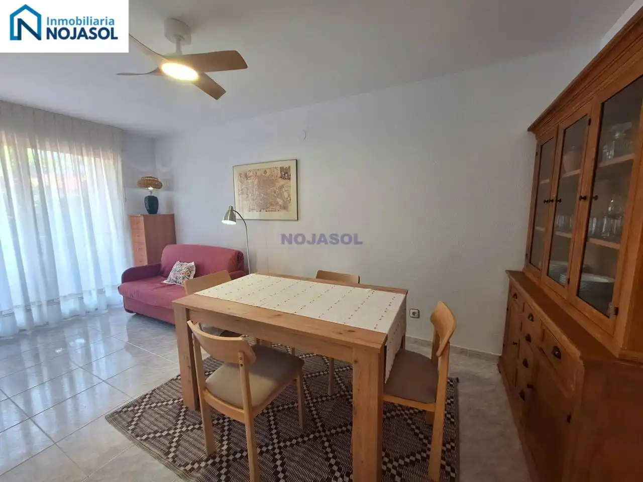 Sala d'estar de Apartament de lloguer en Noja amb Calefacció, Jardí privat i Terrassa