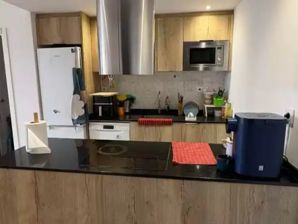Kitchen of Office for rent in Barcelona  with Air Conditioner