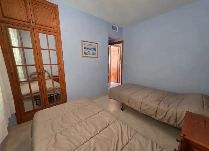 Dormitori de Casa adosada en venda en La Manga del Mar Menor amb Aire condicionat, Jardí privat i Terrassa