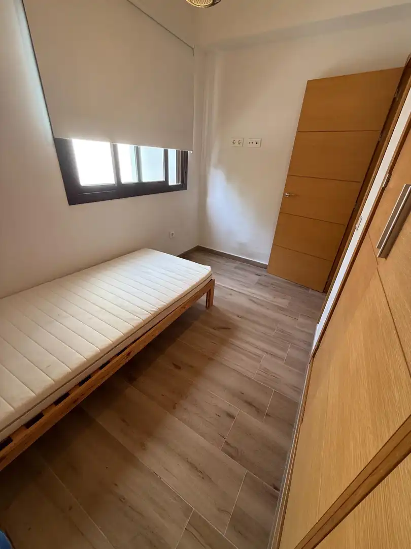 Dormitori de Apartament de lloguer en Málaga amb Aire condicionat, Terrassa i Moblat