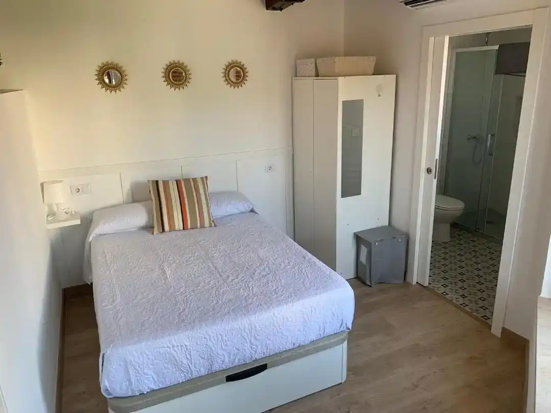 Dormitori de Apartament de lloguer en Logrosán amb Aire condicionat, Parquet i Moblat